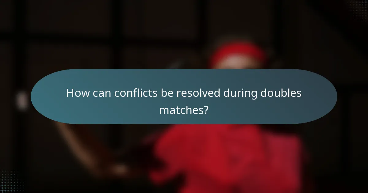 How can conflicts be resolved during doubles matches?